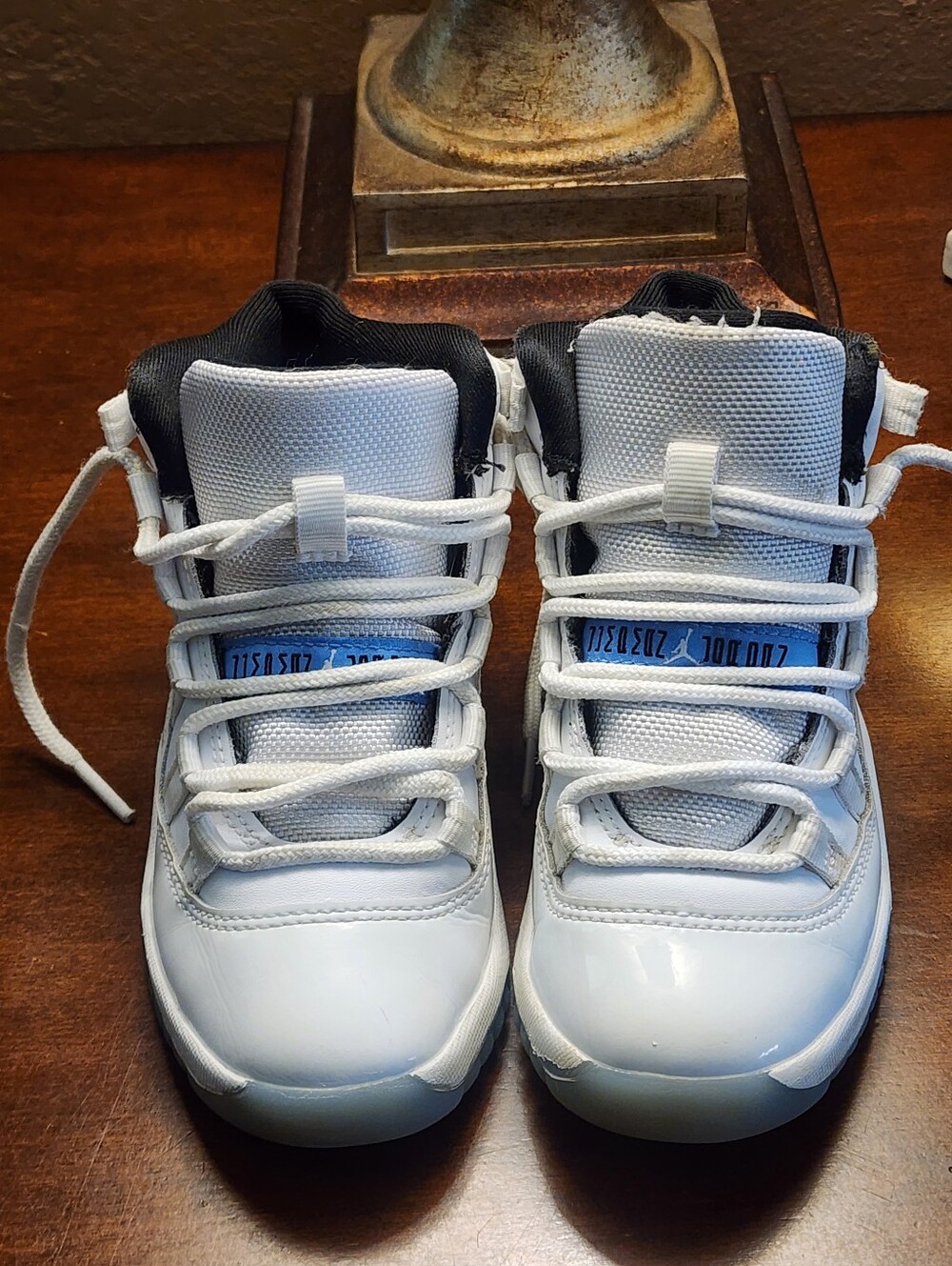 Kids Nike Air Jordan White and Black Basketball Shoes with Blue Accent